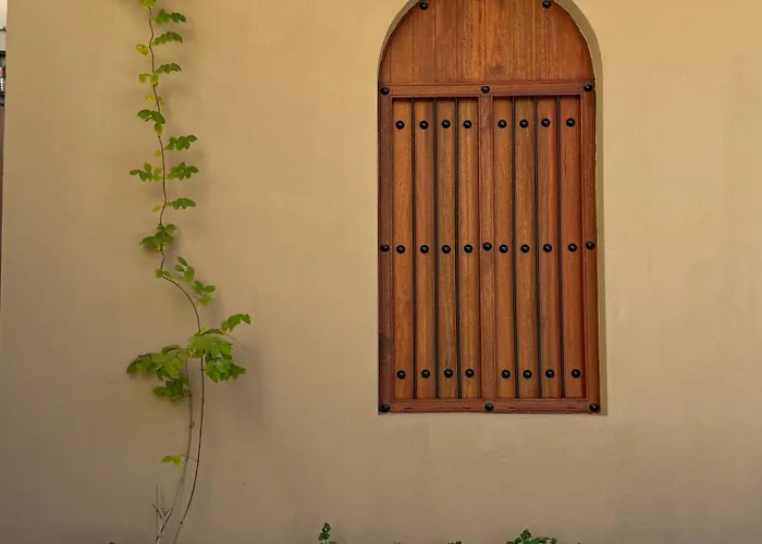بيت أرض الثراء Rich Land House